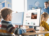 Student Views Theme Overview On Computer.